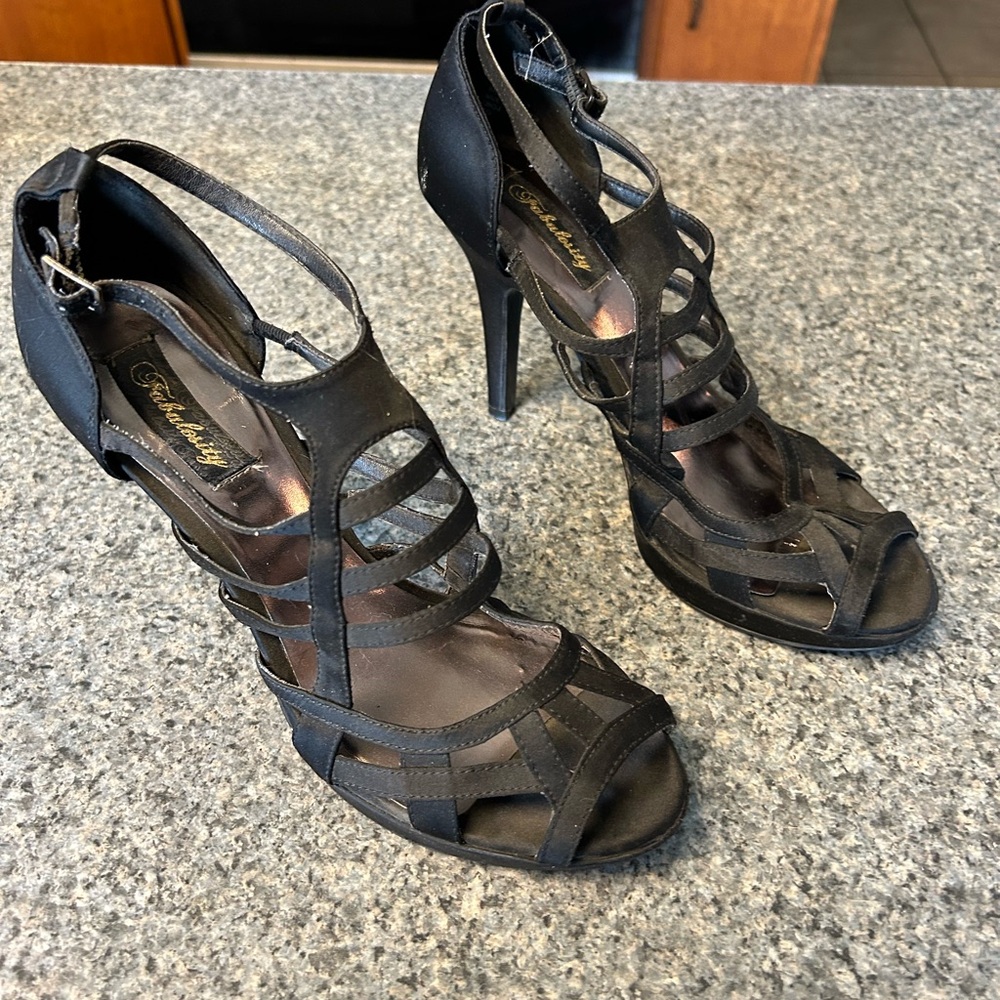 Fabulosity black heels  size 9.5.  4 inch heels